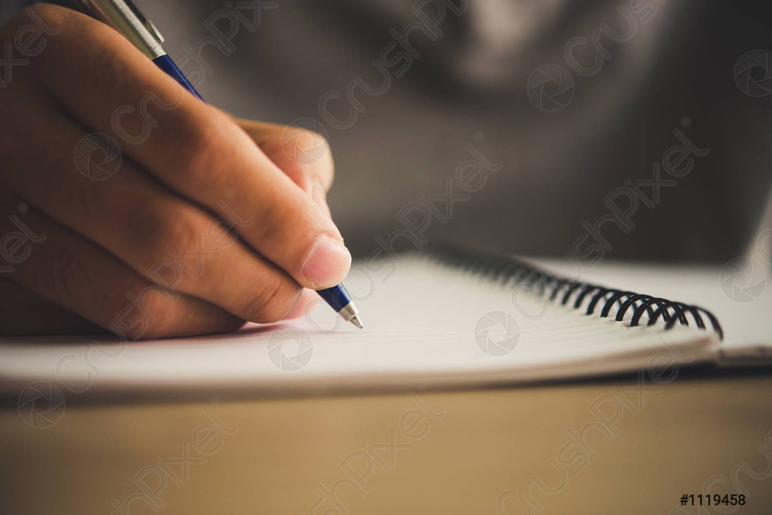man hand with pen writing 1119458